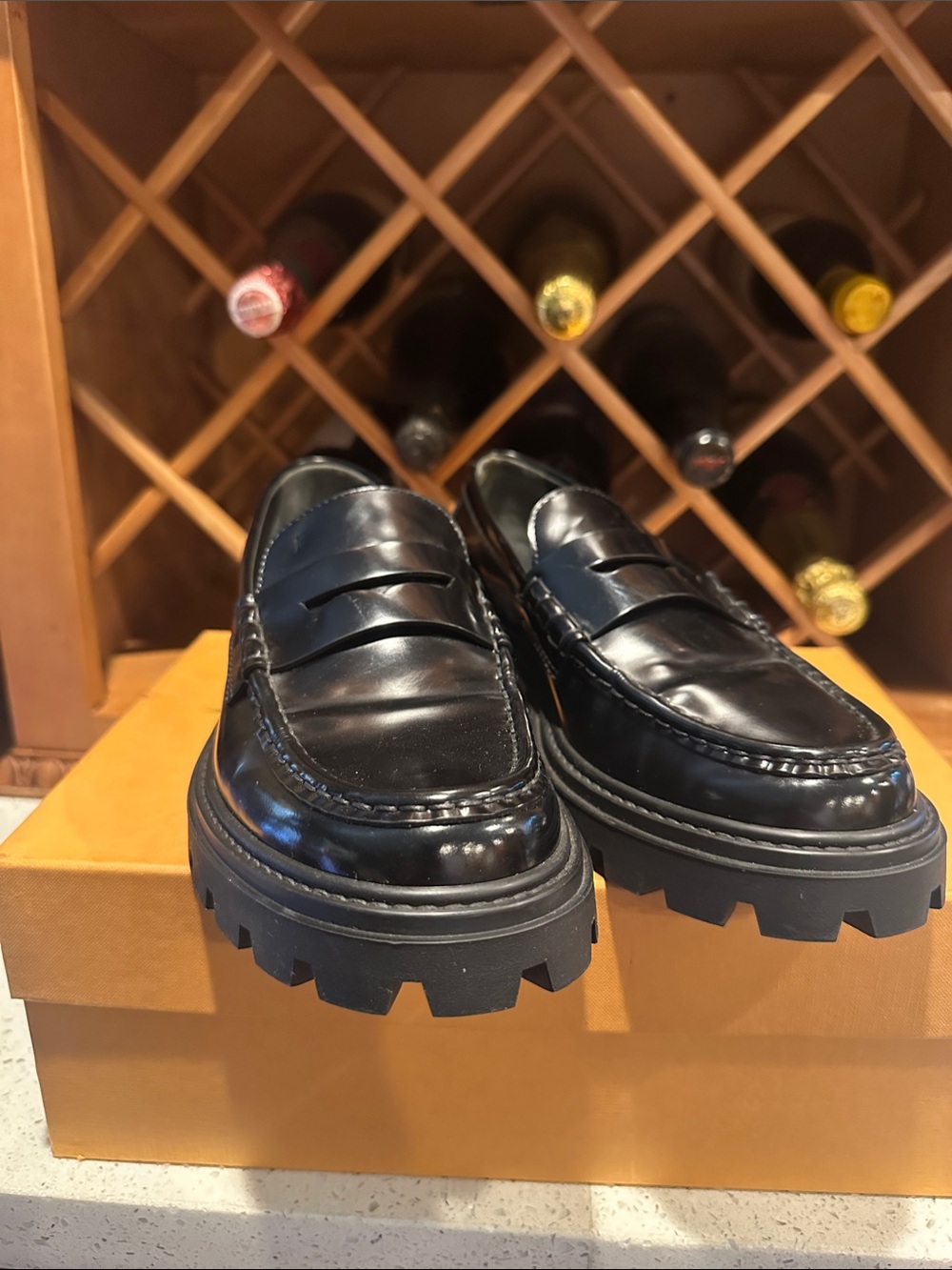 Tod's Black Leather Lug Sole Penny Loafers